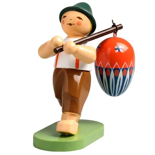 Wendt & Kühn Blumenkind Junge mit Ei am Stab